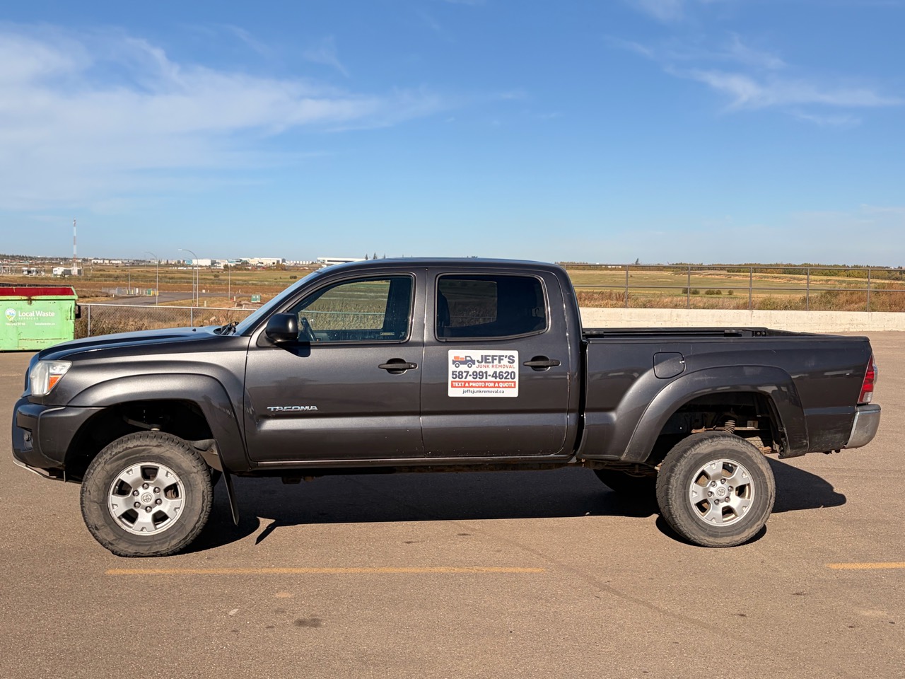 Side view of Jeff’s branded pickup truck